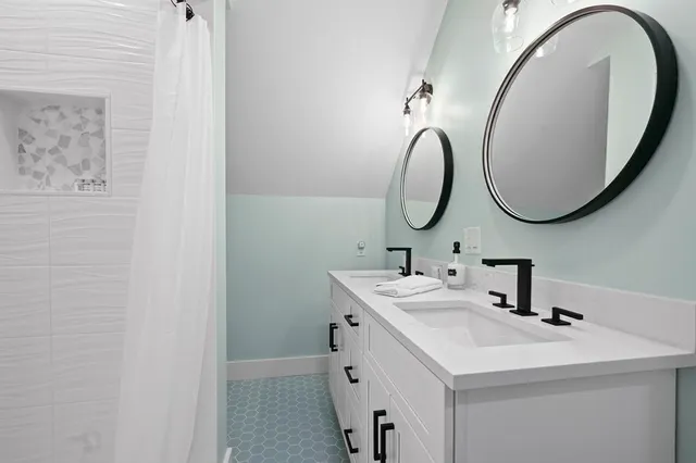 a view of a balcony with wooden floor