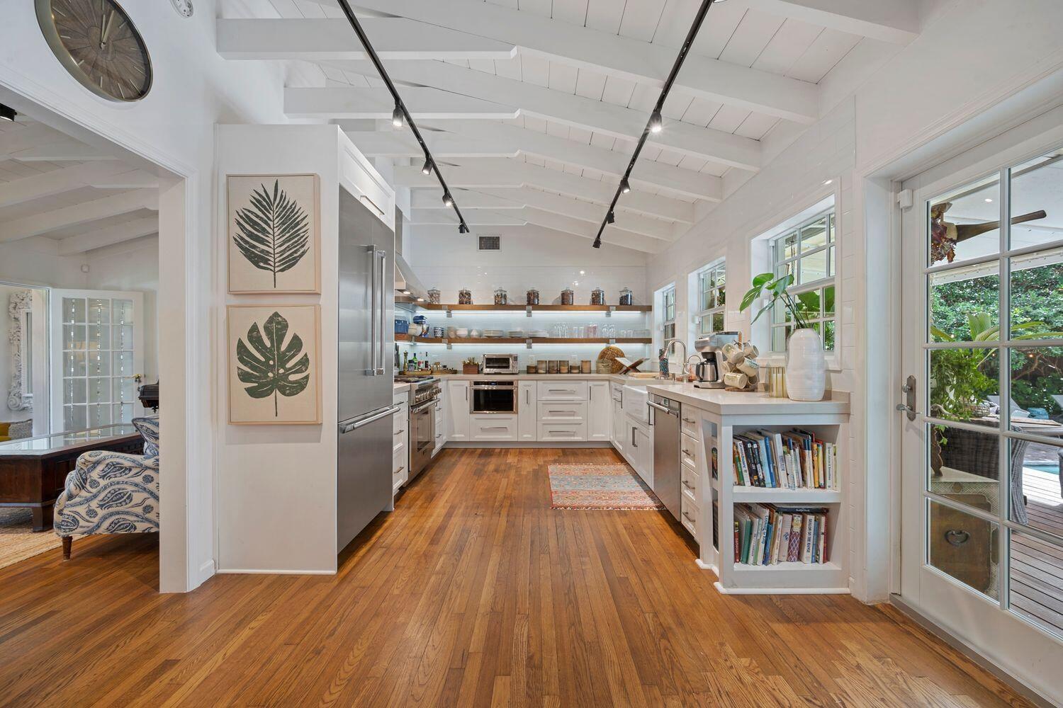 302 Northwest 16th Street Delray Beach, FL 33444 - Photo 13 of 46 a view of a hallway with wooden floor