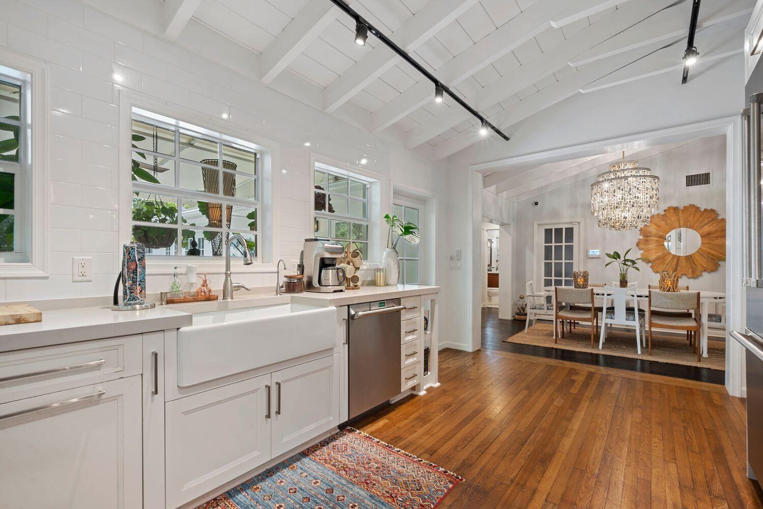 302 Northwest 16th Street Delray Beach, FL 33444 - Photo 17 of 46 a kitchen with sink cabinets and window