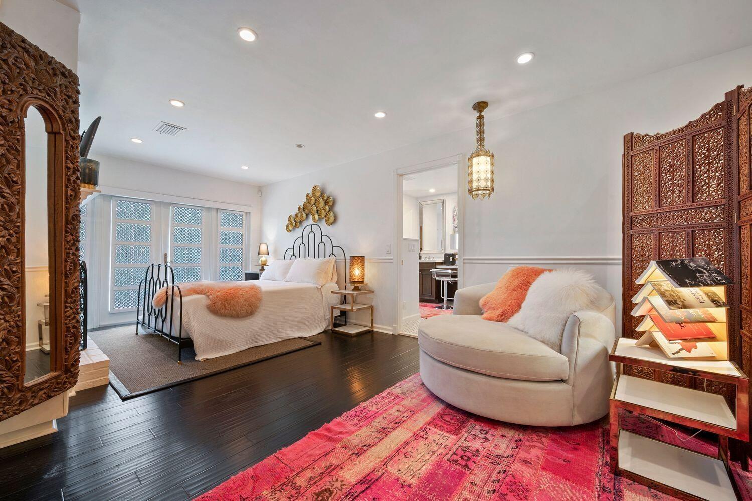 302 Northwest 16th Street Delray Beach, FL 33444 - Photo 23 of 46 a bedroom with furniture and a couch