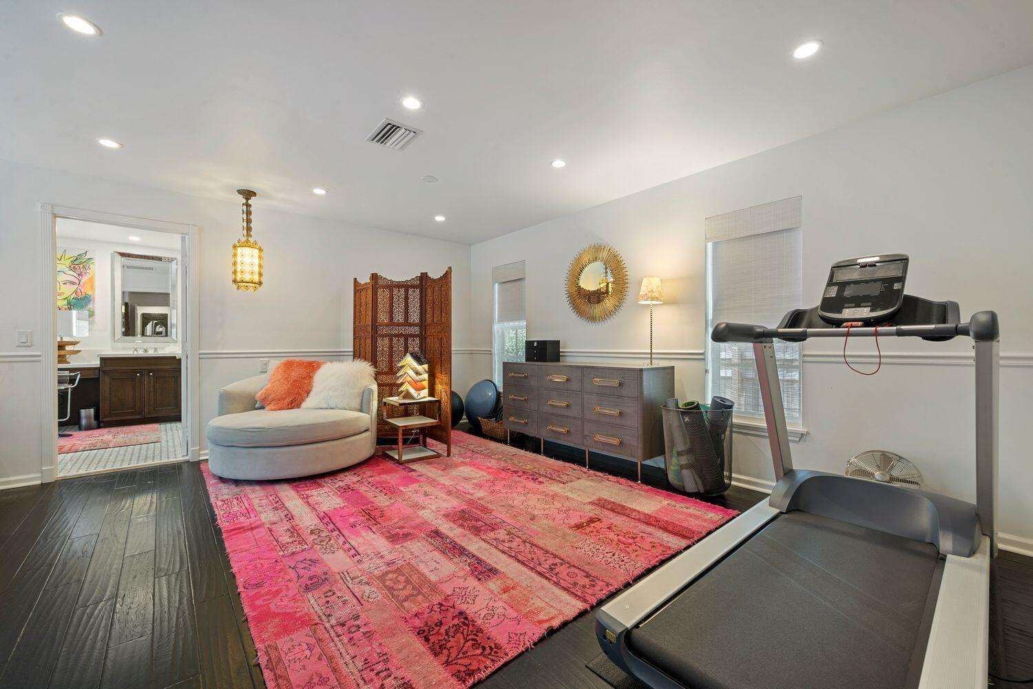 302 Northwest 16th Street Delray Beach, FL 33444 - Photo 24 of 46 a living room with a couch and a fireplace