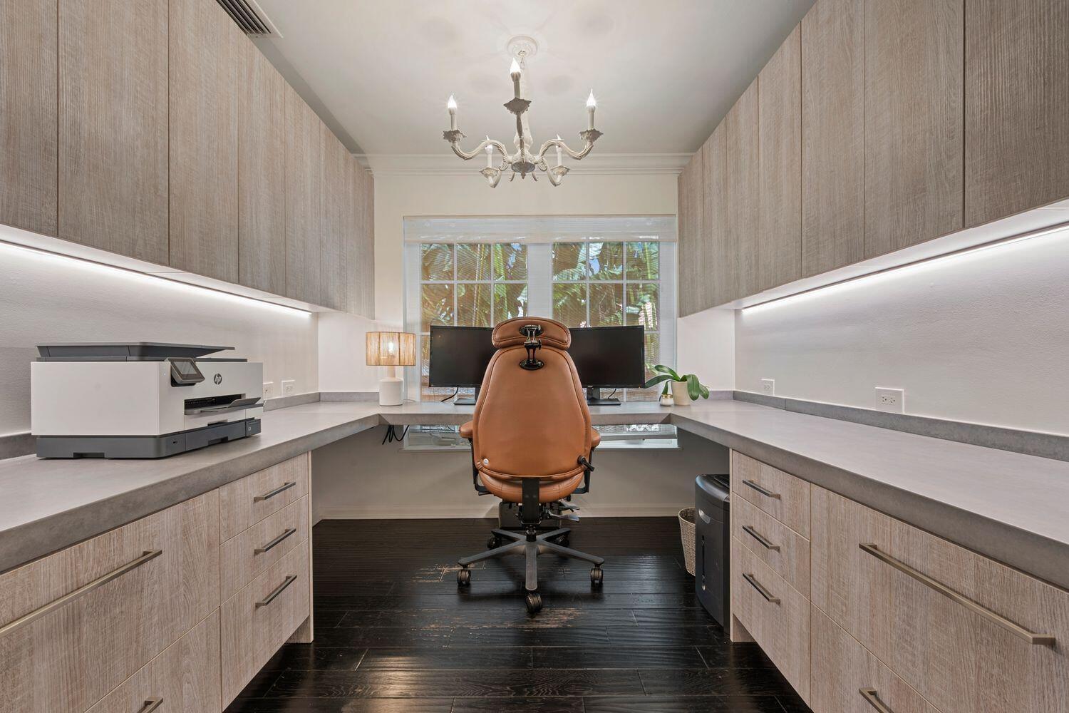 302 Northwest 16th Street Delray Beach, FL 33444 - Photo 28 of 46 a workspace with furniture window and wooden floor