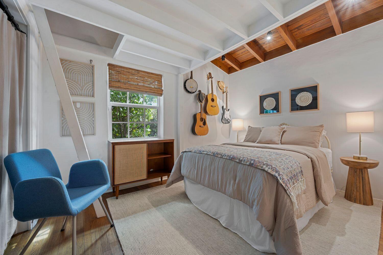 302 Northwest 16th Street Delray Beach, FL 33444 - Photo 32 of 46 a bedroom with furniture and a window