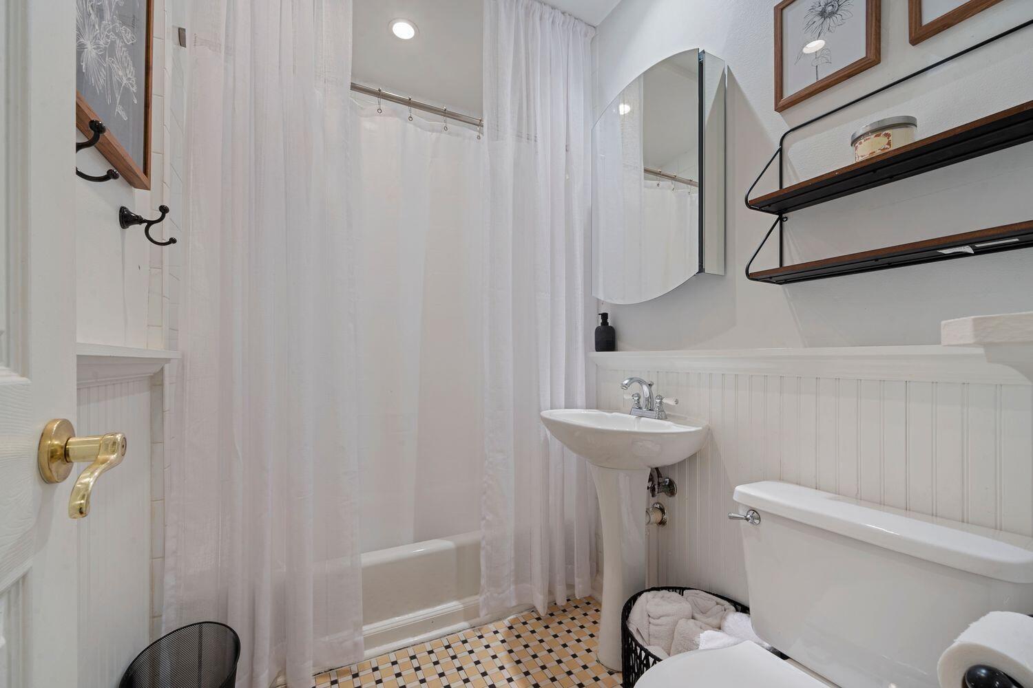 302 Northwest 16th Street Delray Beach, FL 33444 - Photo 34 of 46 a bathroom with a sink a toilet and shower