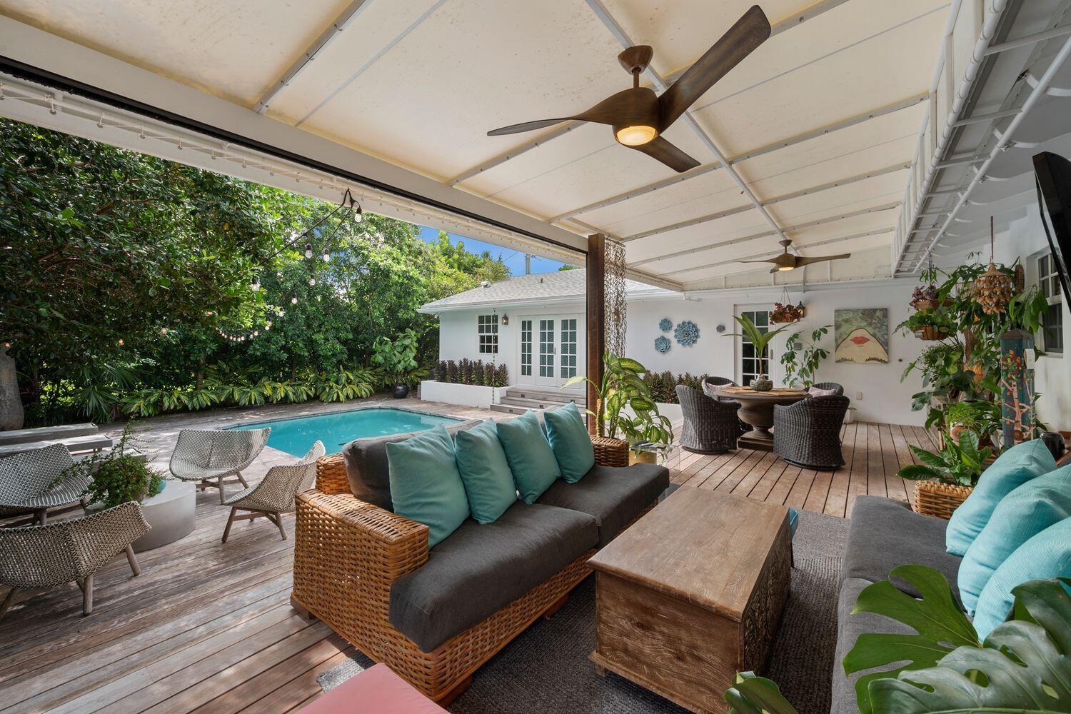 302 Northwest 16th Street Delray Beach, FL 33444 - Photo 41 of 46 a outdoor living space with furniture and garden view