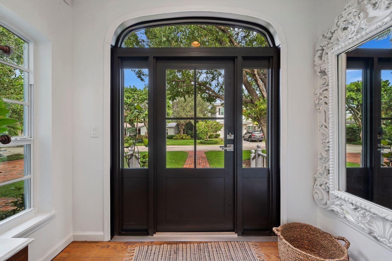 302 Northwest 16th Street Delray Beach, FL 33444 - Photo 8 of 46 a view of entryway with a front door