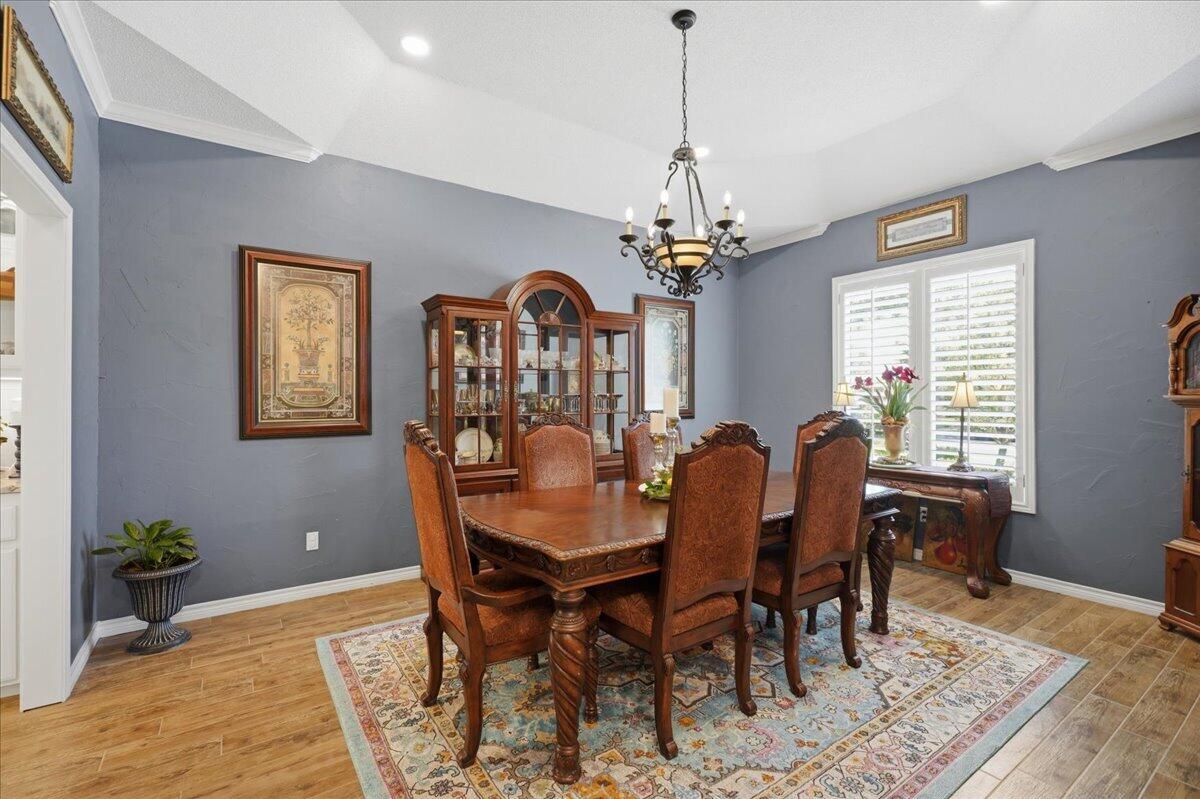 4612 100th Street Lubbock, TX 79424 - Photo 24 of 55 a view of a dining room with furniture window and wooden floor