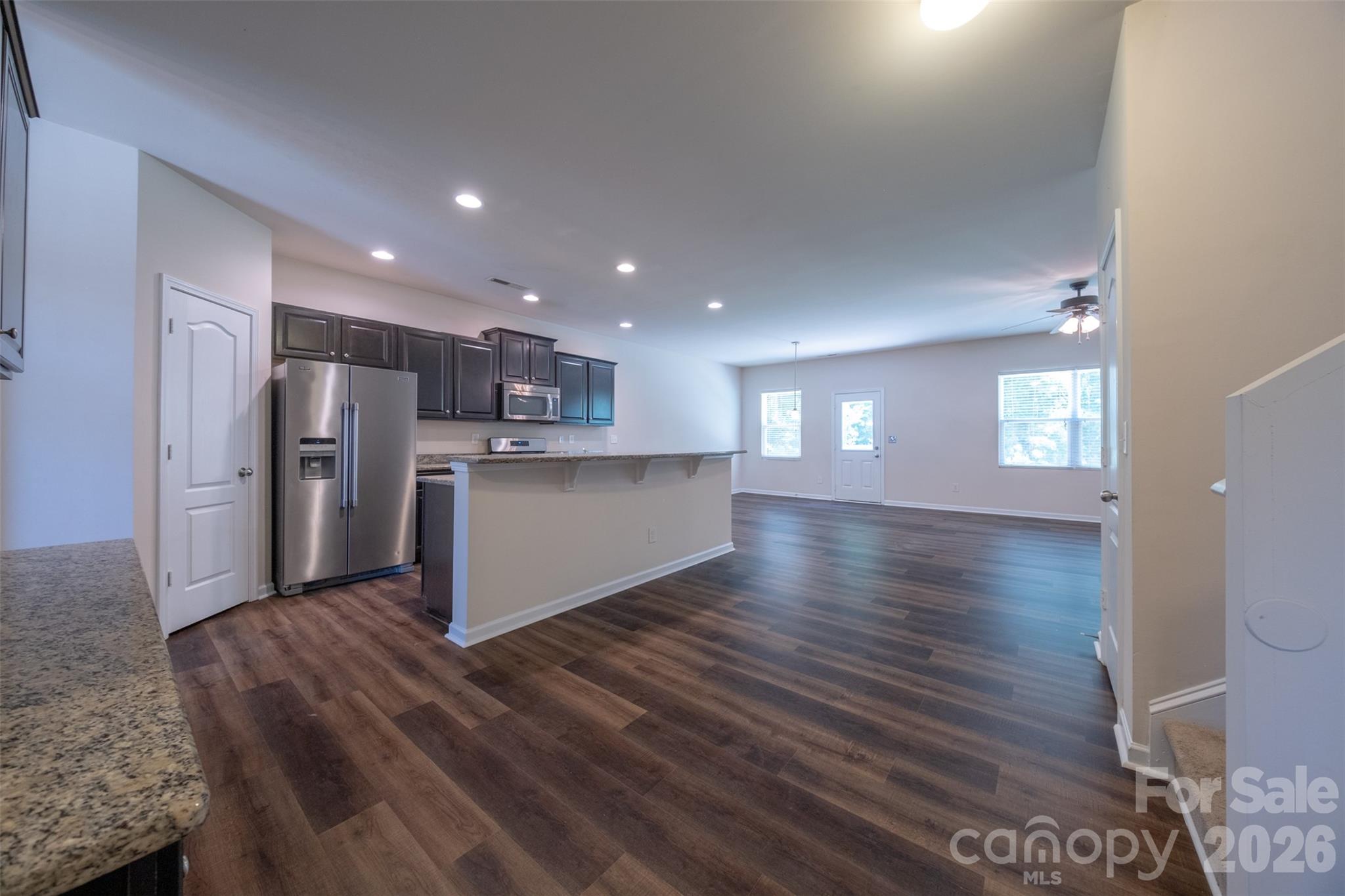 3006 Houndscroft Road Indian Trail, NC 28079 - Photo 10 of 39 a view of kitchen and wooden floor