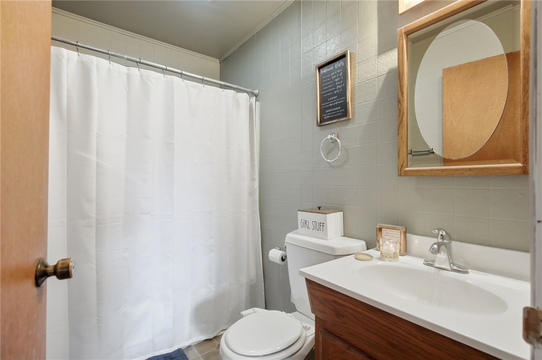 2745 Share Street Springfield, OH 45505 - Photo 19 of 28 This clean bathroom features a classic vanity and shower, providing everyday comfort and functionality.