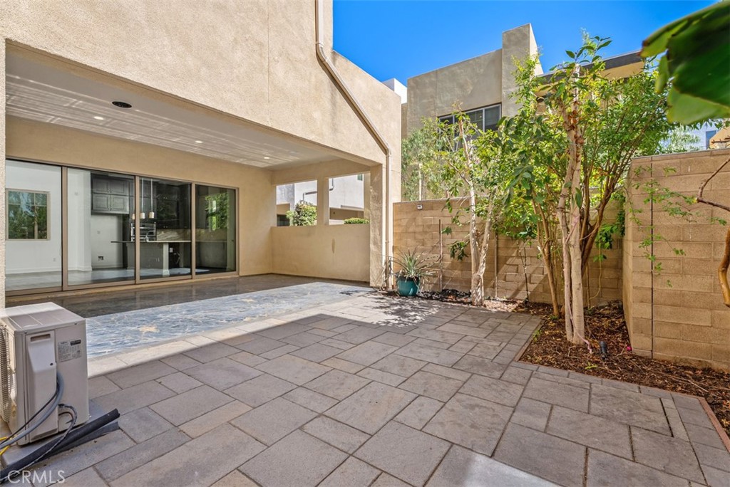 123 Interval Irvine, CA 92618 - Photo 21 of 75 a view of a entryway door front of house
