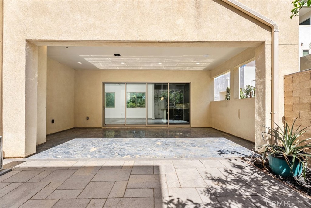 123 Interval Irvine, CA 92618 - Photo 22 of 75 a view of a entrance door of the house
