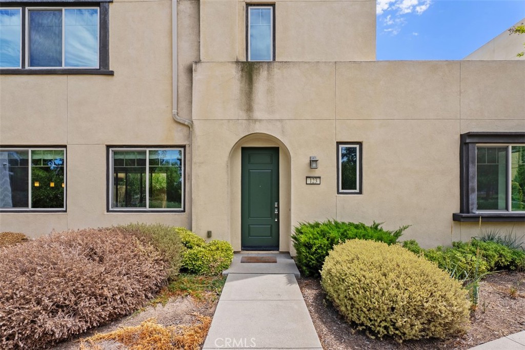 123 Interval Irvine, CA 92618 - Photo 3 of 75 a front view of a house