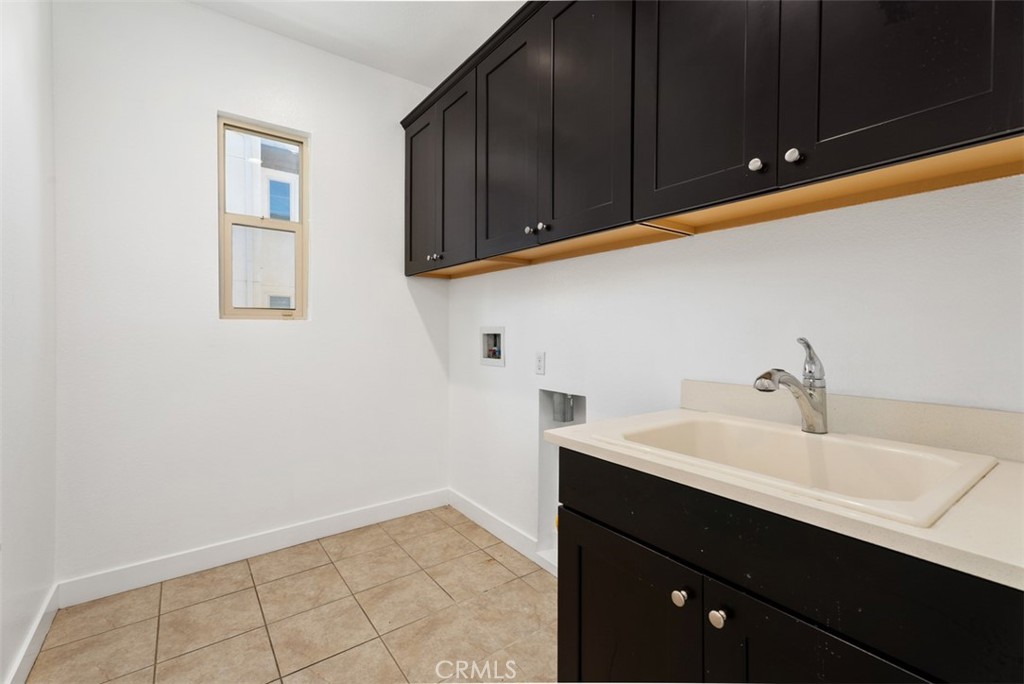 123 Interval Irvine, CA 92618 - Photo 37 of 75 a bathroom with a sink and a mirror