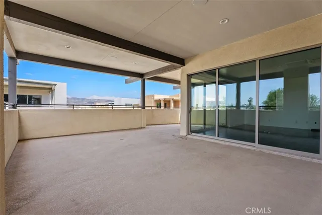 a view of a house with pool and a yard