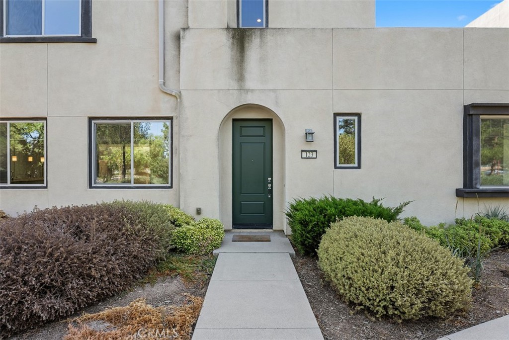 123 Interval Irvine, CA 92618 - Photo 48 of 75 a front view of a house