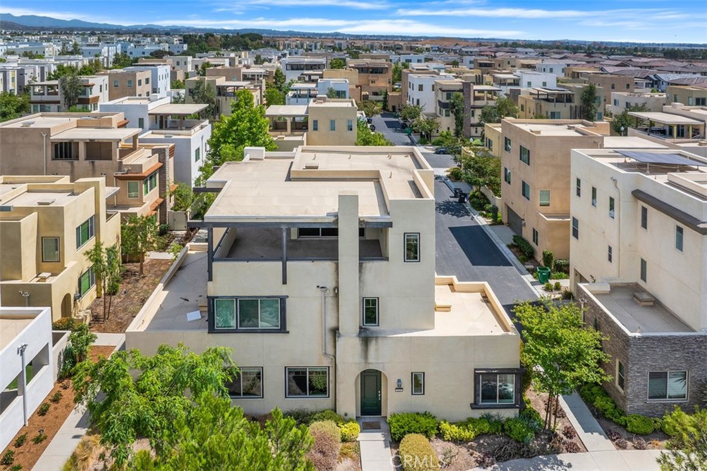 123 Interval Irvine, CA 92618 - Photo 54 of 75 an aerial view of a house with a yard