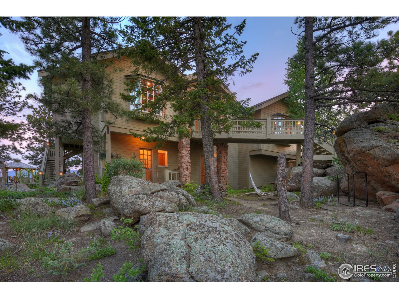 6171 Flagstaff Road Boulder, CO 80302 - Photo 33 of 40 a front view of a house with garden
