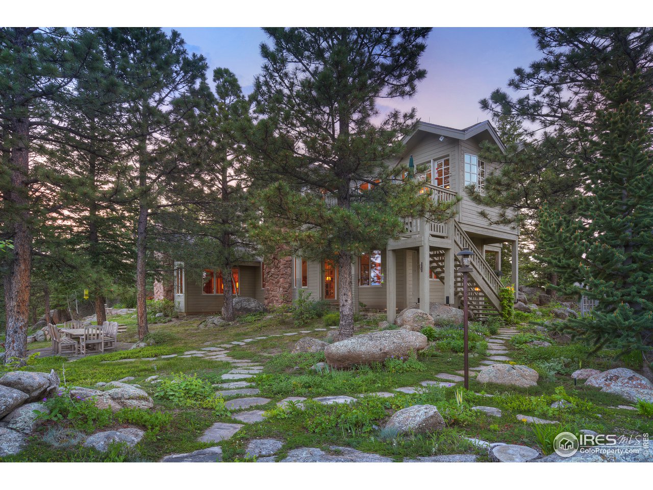 6171 Flagstaff Road Boulder, CO 80302 - Photo 37 of 40 a view of a house with a garden