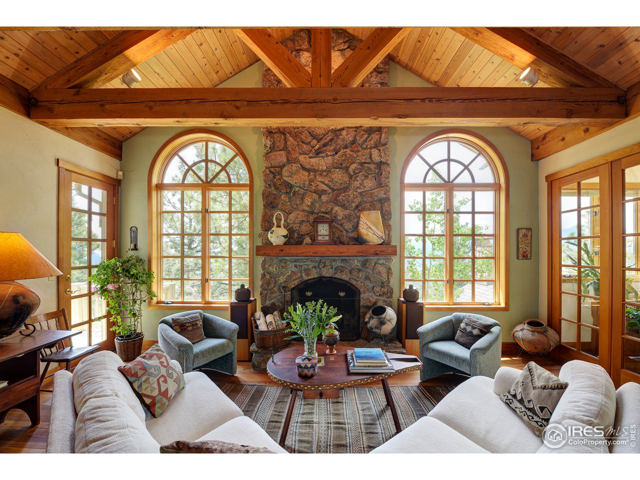 6171 Flagstaff Road Boulder, CO 80302 - Photo 4 of 40 a living room with furniture and a large window