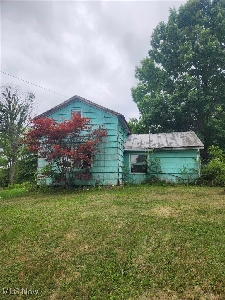 7481 Lafayette Road Lodi, OH 44254 - Photo 1 of 13 View of outdoor structure with a yard