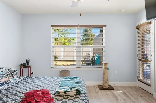 a bathroom with a granite countertop sink mirror and vanity