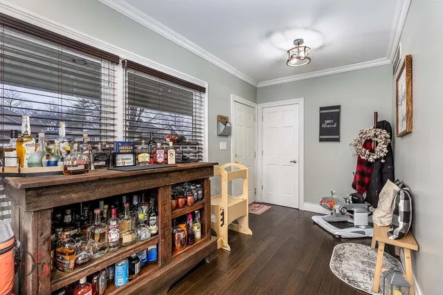 a room with furniture and wooden floor