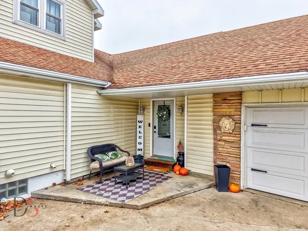 a view of a house with a patio