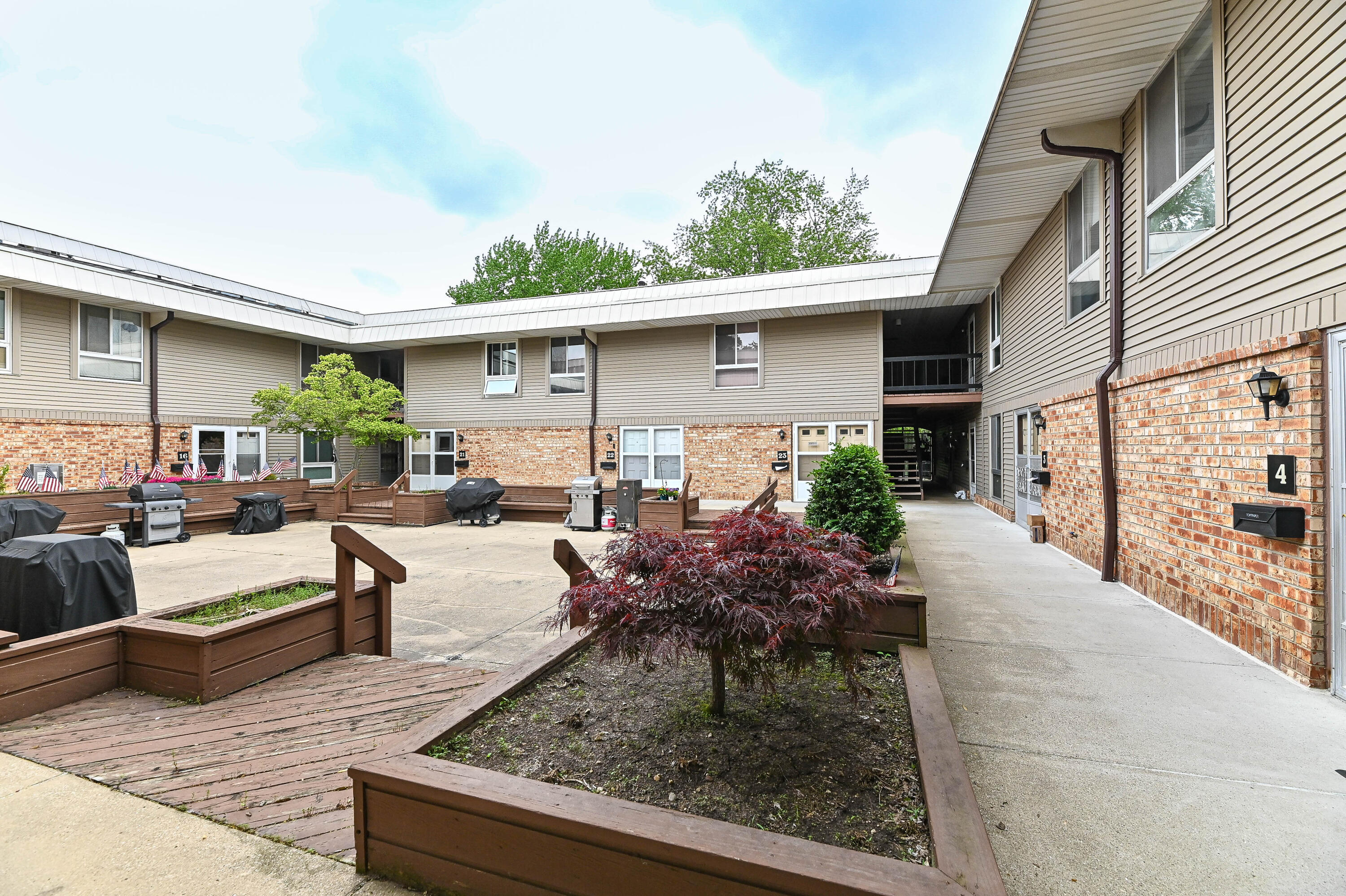 11926 West Mill Road, Unit 4 Milwaukee, WI 53225 - Photo 22 of 40 Courtyard for building