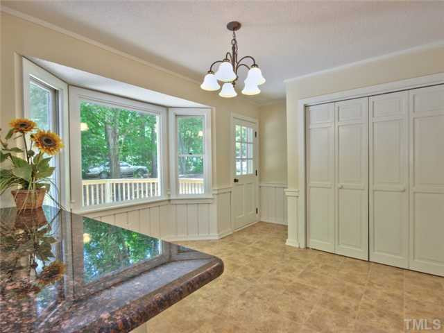 2701 Smokey Ridge Road Raleigh, NC 27613 - Photo 9 of 25 View looking toward the breakfast nook. this view accents the bay window and the door leading to the deck. Breakfast Area