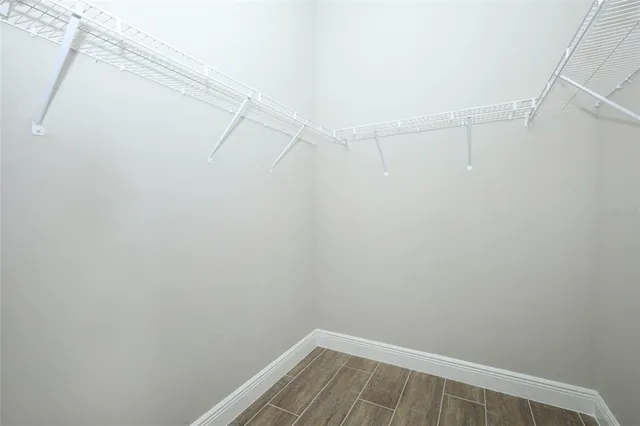 a view of a room with racks on the wall