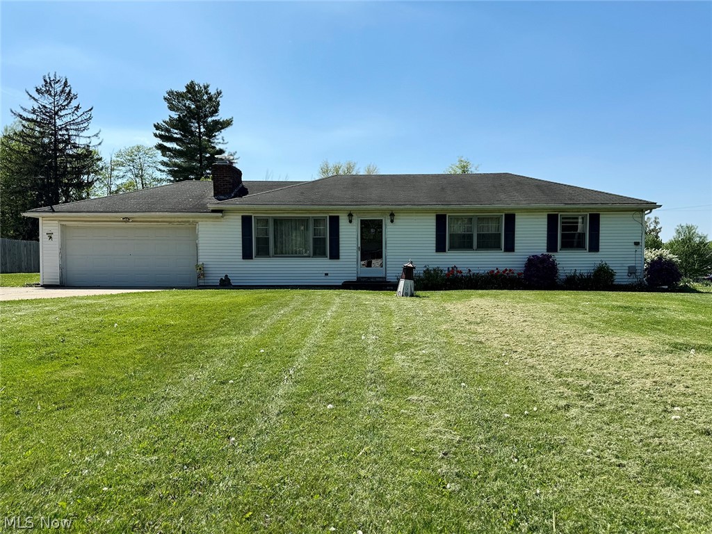5934 Ryan Road Medina, OH 44256 - Photo 1 of 24 Ranch-style home featuring a garage and a front lawn