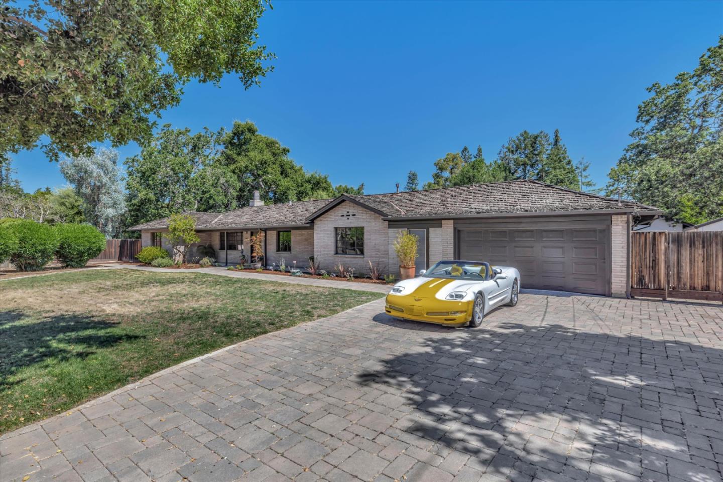 4150 Rincon Circle Palo Alto, CA 94306 - Photo 1 of 32 a front view of a house with garden