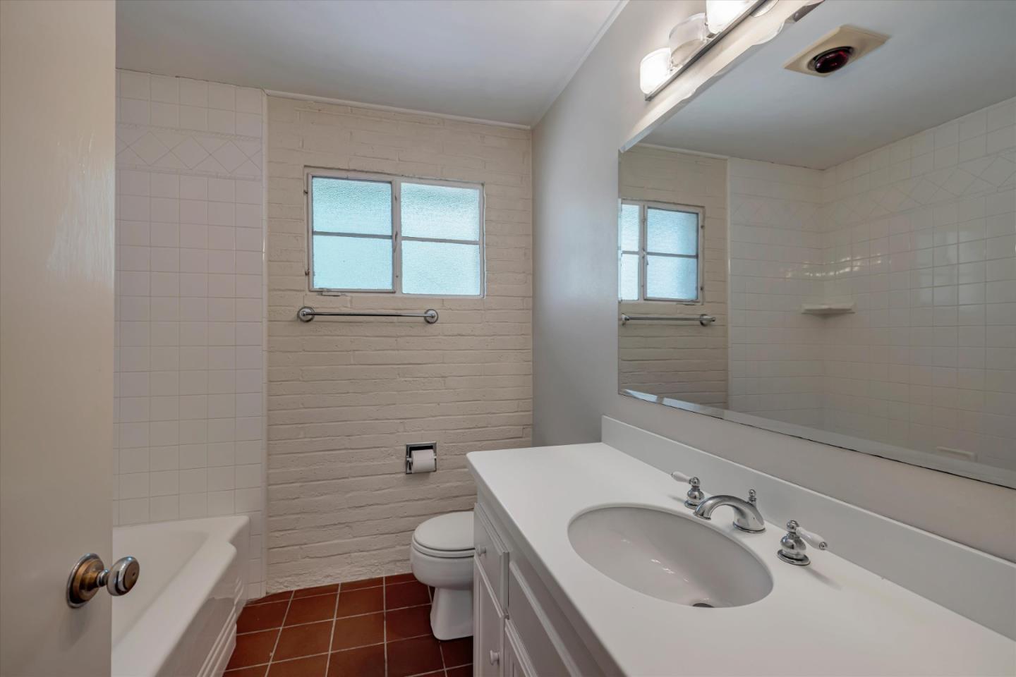4150 Rincon Circle Palo Alto, CA 94306 - Photo 20 of 32 a bathroom with a sink toilet and shower