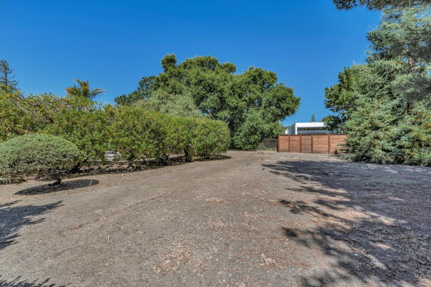 4150 Rincon Circle Palo Alto, CA 94306 - Photo 28 of 32 a view of a house with backyard and trees
