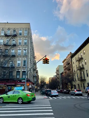 a backyard of a house with sofas