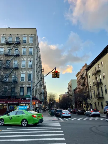 a backyard of a house with sofas