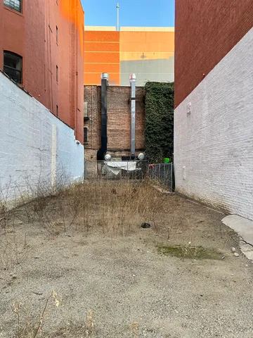 a black and white photo of a bathroom