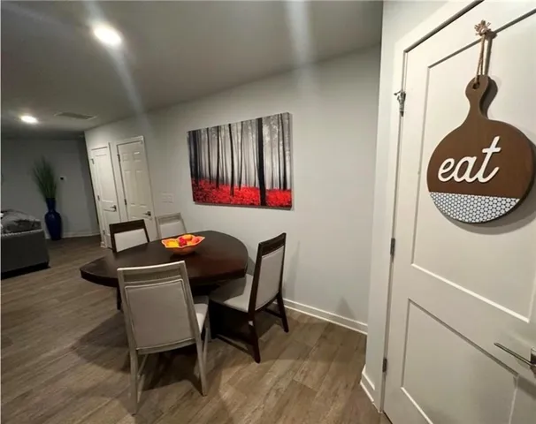 a room with a table and chairs