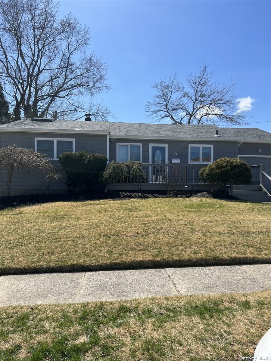 5 Peter Lane Plainview, NY 11803 - Photo 1 of 1 a front view of a house with a yard