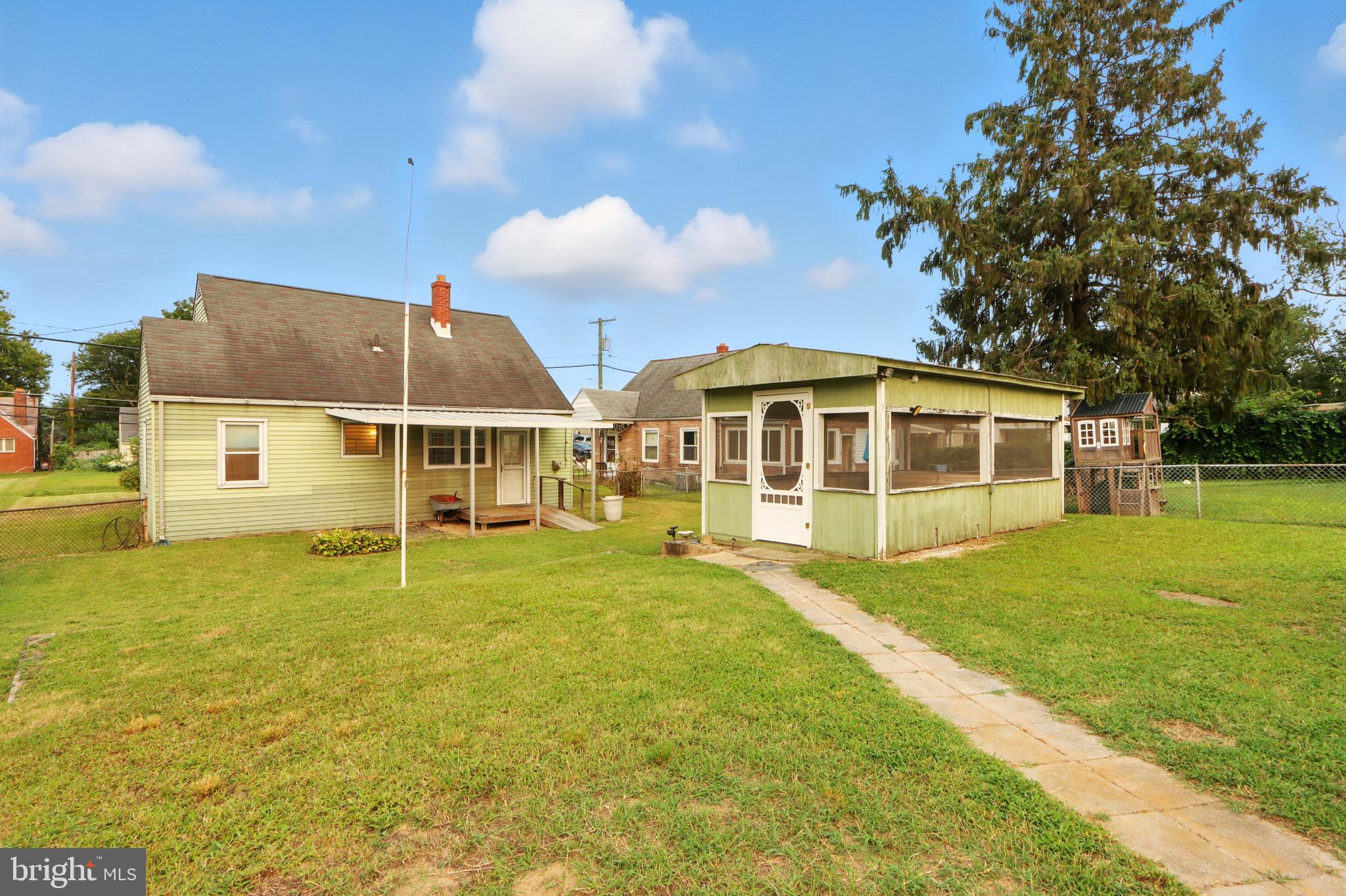 3108 Sollers Point Road Baltimore, MD 21222 - Photo 25 of 41 a view of a house with a yard