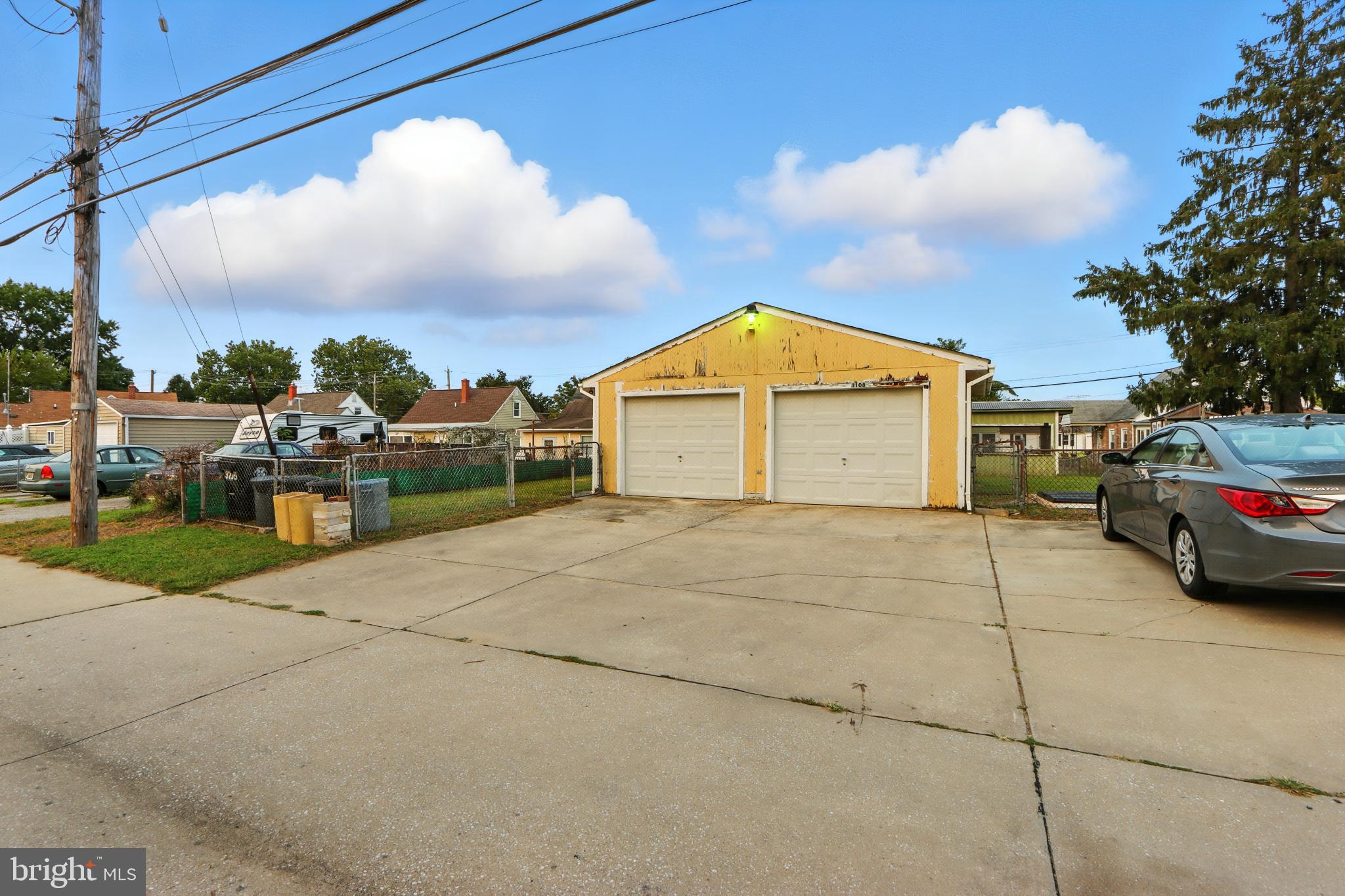 3108 Sollers Point Road Baltimore, MD 21222 - Photo 26 of 41 a view of a car park in front of house