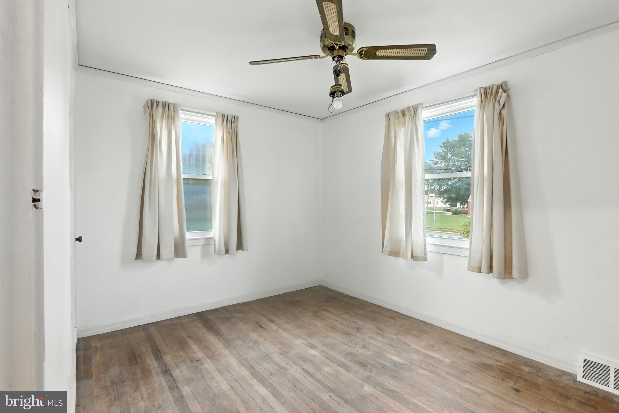 3108 Sollers Point Road Baltimore, MD 21222 - Photo 35 of 41 a view of an empty room with a window