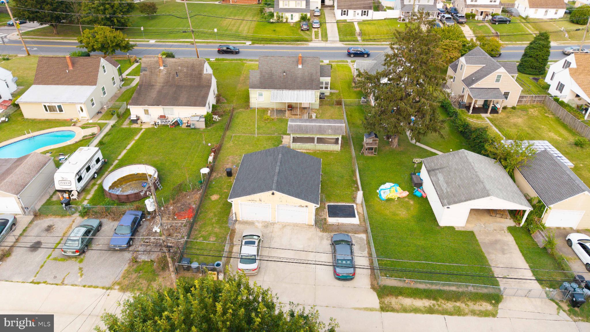 3108 Sollers Point Road Baltimore, MD 21222 - Photo 5 of 41 an aerial view of residential houses with outdoor space