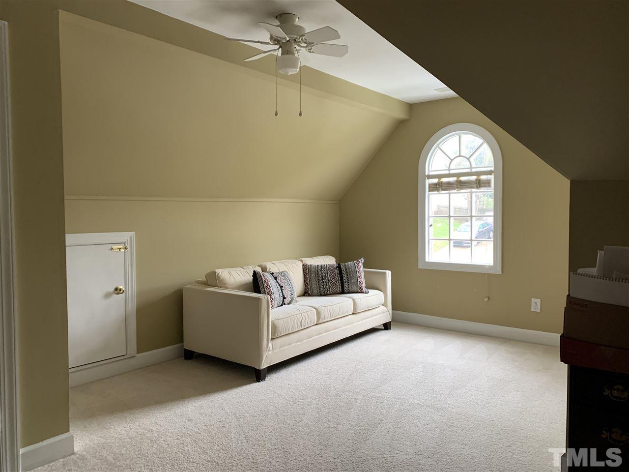 9105 Cub Trail Raleigh, NC 27615 - Photo 17 of 22 a living room with furniture and a window