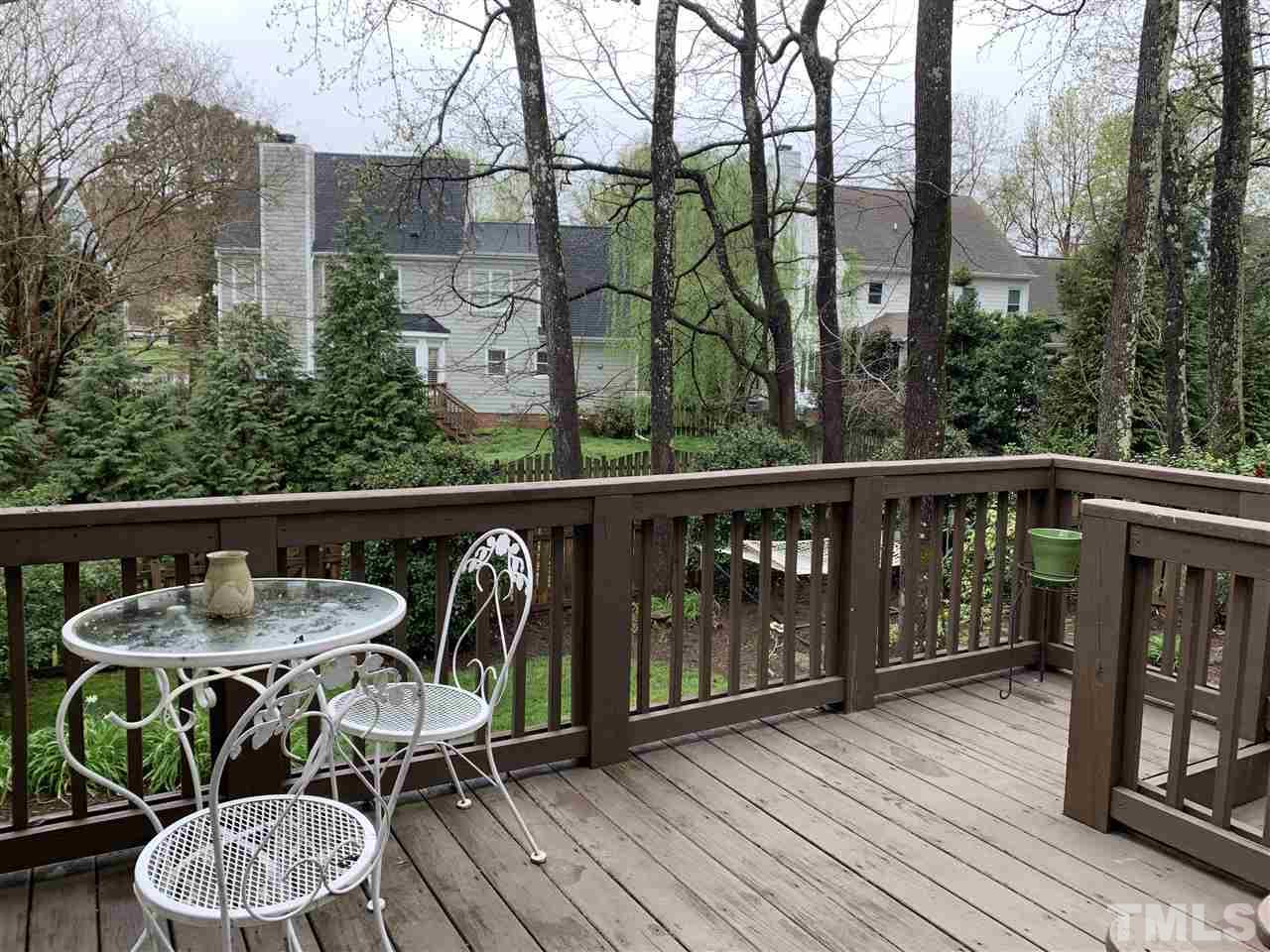 9105 Cub Trail Raleigh, NC 27615 - Photo 19 of 22 a view of balcony with furniture and wooden floor