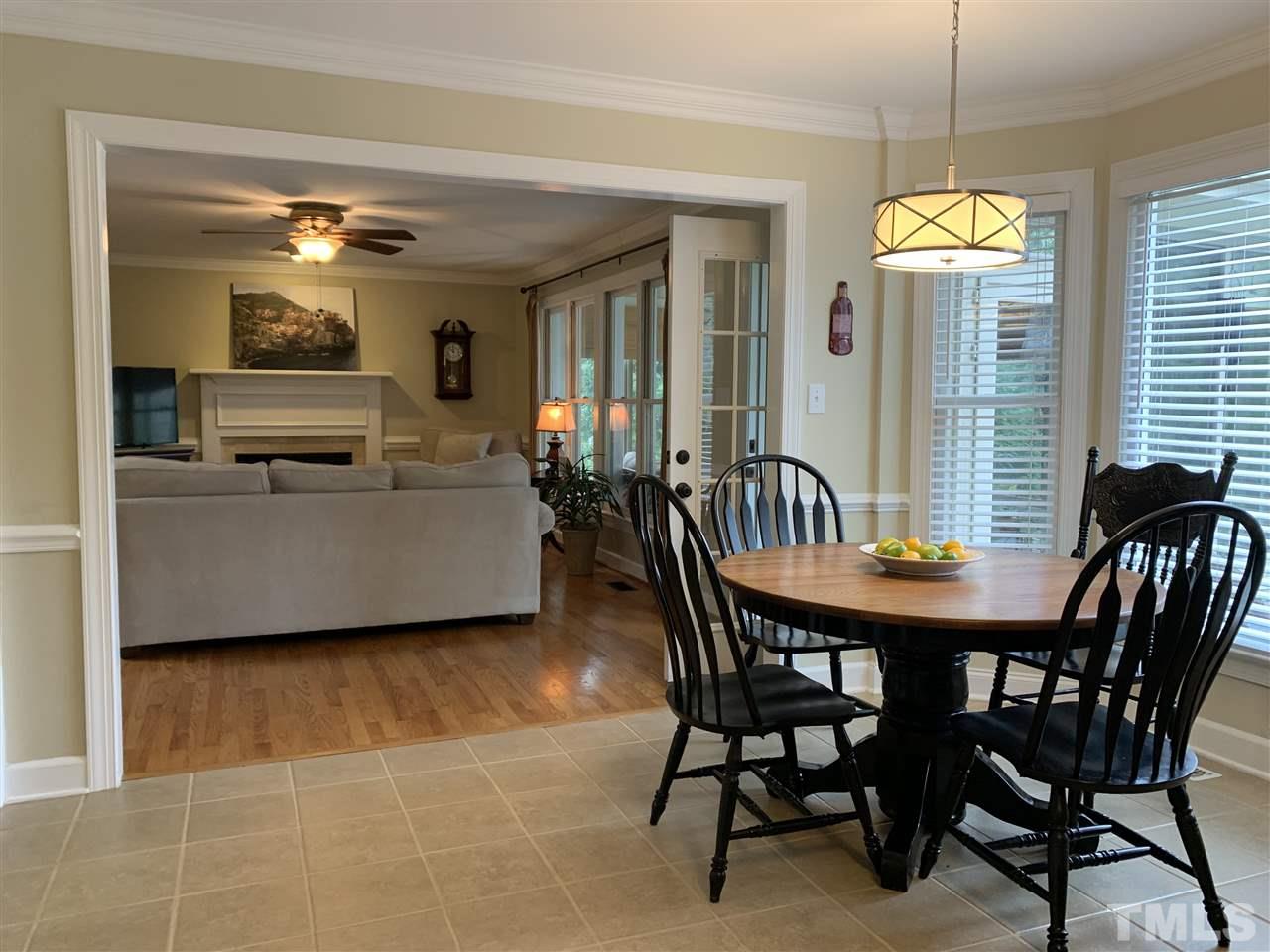 9105 Cub Trail Raleigh, NC 27615 - Photo 6 of 22 a view of a dining room with furniture window and outside view