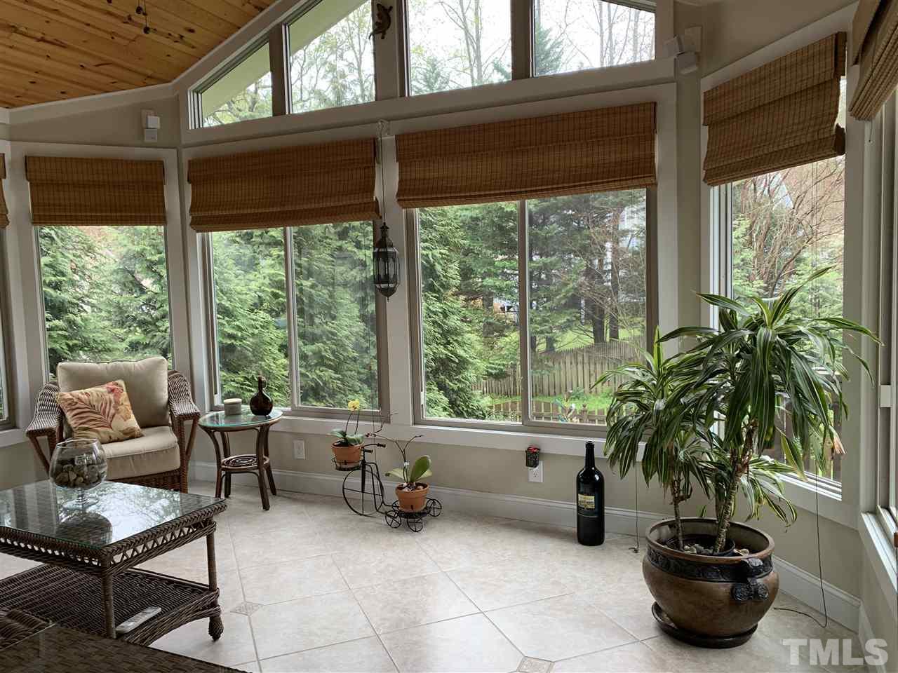 9105 Cub Trail Raleigh, NC 27615 - Photo 7 of 22 a living room with furniture and a potted plant