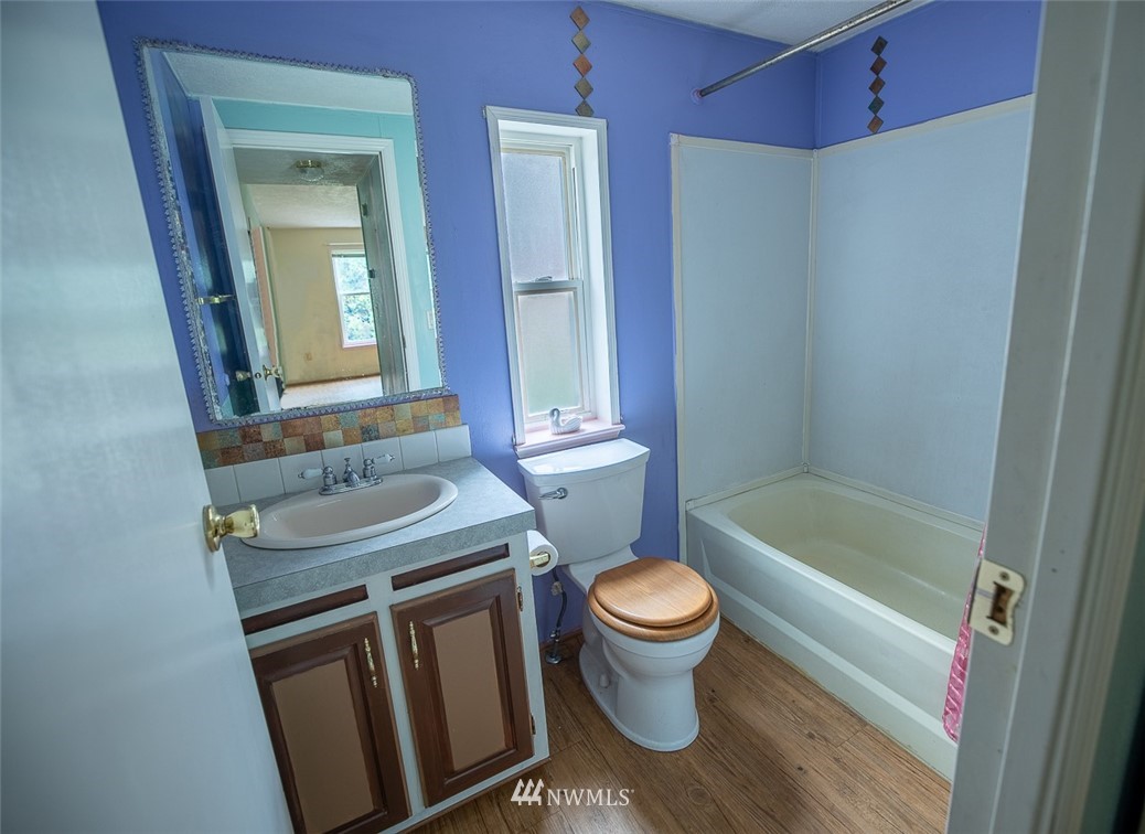 373 Conconully Road Okanogan, WA 98840 - Photo 13 of 24 a bathroom with a sink toilet and shower