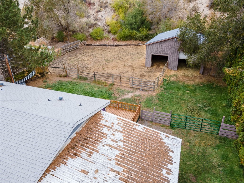 373 Conconully Road Okanogan, WA 98840 - Photo 23 of 24 a backyard of a house with seating space