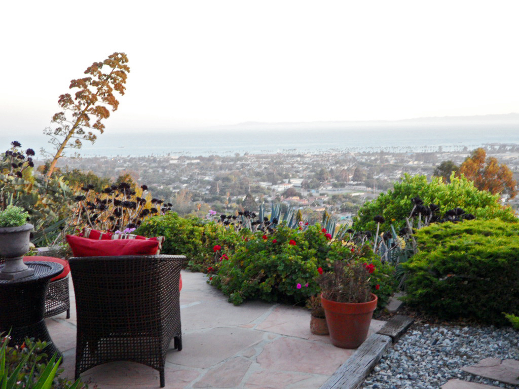 238 Las Alturas Road Santa Barbara, CA 93103 - Photo 16 of 20 a view of a terrace with a chair and a potted plant